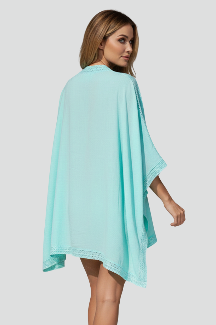 Women’s V-Neck Tunic with Wide Sleeves and Textured Surface